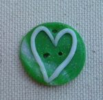 Bouton_vert_avec_un_coeur