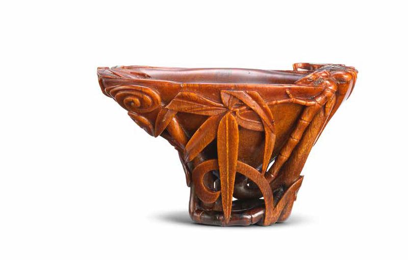 A superb rhinoceros horn lingzhi-shaped 'bamboo' libation cup, 17th-18th century