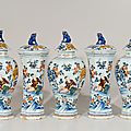 Polychrome chinoiserie garniture of five vases and covers. delft, circa 1760-75