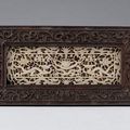 A fine jade panel mounted in a wooden frame, minor wear, china, 18th century