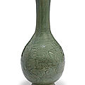 A large carved longquan celadon pear-shaped bottle, ming dynasty (1368-1644)