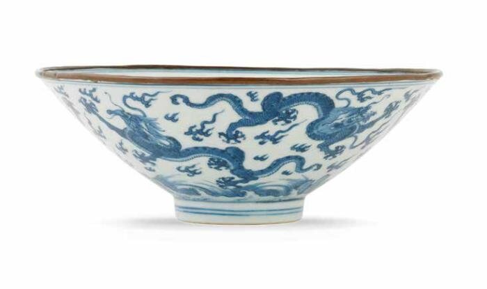 A rare Ming-style blue and white 'six dragons' bowl, Xuande six-character mark, early 18th century