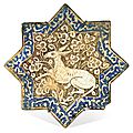 A kashan lustre pottery star tile, persia, circa 1300