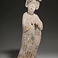 A large painted pottery figure of a court lady, Tang dynasty (618-907)