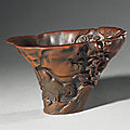An outstanding and rare rhinoceros horn 'chickens' libation cup, signed by you kan, qing dynasty, kangxi period (1662-1722)
