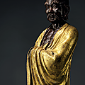 A finely cast parcel-gilt bronze figure of damo, ming dynasty, 16th century