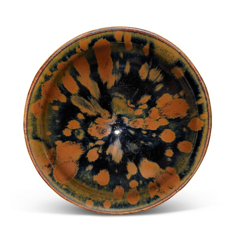 A superb Henan russet-splashed blacked-glazed 'partridge feather' temmoku bowl, Northern Song dynasty (960-1127)
