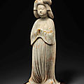 A large painted red pottery figure of a court lady, Tang dynasty (AD 618-907)