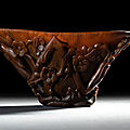 A fine carved rhinoceros horn prunus libation cup, 17th-18th century