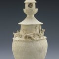 Jar with building, praying human figure, and animals of the four directions 12th-13th century Southern Song dynasty Porcelain with areas of qingbai glaze H: 14.3 W: 16.1 D: 15.8 cm Southeastern, Southeastern China