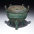 A bronze ritual tripod food vessel and cover, ding, late spring and autumn period, 5th century bc