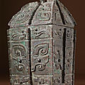 A rare archaic bronze wine vessel and cover, fangyi, late shang dynasty, 13th - 11th century bc