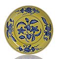 A rare imperial yellow-ground blue and white 'gardenia dish'. zhengde six-character mark within double-circles and of the perio