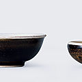 Two white-brown-glazed bowls, Tang dynasty (618-907)
