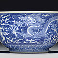 A small blue and white 'dragon' bowl, qianlong seal mark in underglaze blue and of the period (1736-1795)