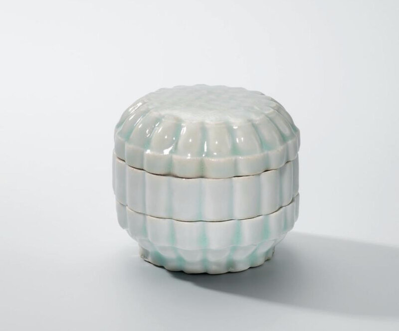 A Qingbai three-tiered chrysanthemum-shaped box and cover, Song dynasty (960-1279)
