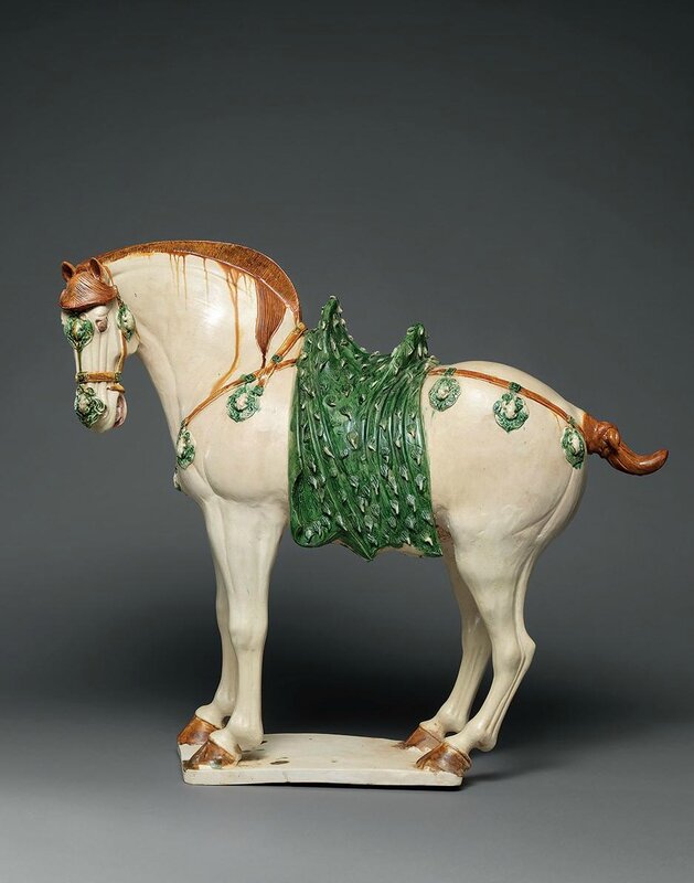 A large sancaiglazed figure of a caparisoned horse, Tang dynasty (618