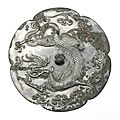 Lobed mirror with a dragon and clouds, China, mid-Tang dynasty, first half of 8th century