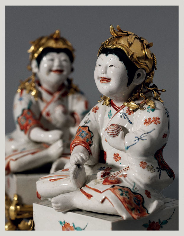 A Pair of Kakiemon Models of Karako (Chinese Boys) Seated on Go Boards with French Gilt Bronze Mounts 1