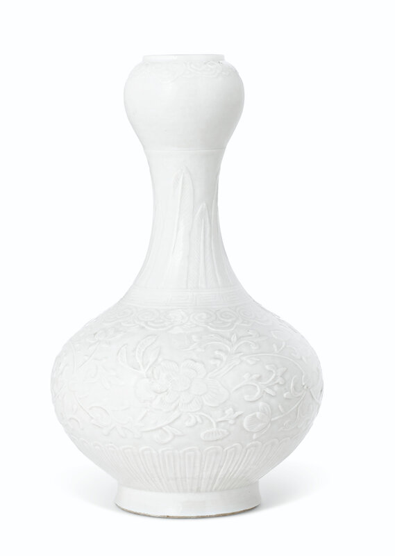 A whiteglazed molded softpaste porcelain 'garlic head' bottle vase
