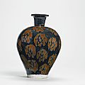 A black-glazed and russet jar, Song dynasty