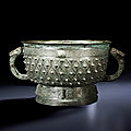 A very finely cast bronze ritual food vessel and cover, gui, late shang dynasty, 11th century bc