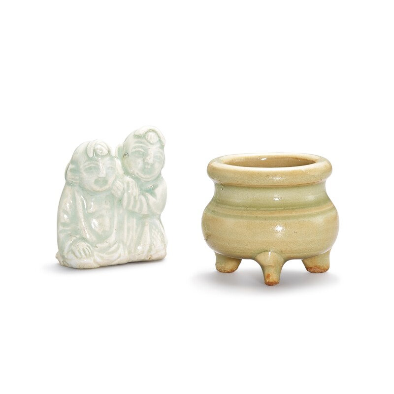 A small Yaozhou celadon tripod censer and a qingbai figure of two boys, Song dynasty
