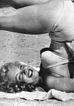 1949_tobey_beach_by_dedienes_umbrella_red_076_1