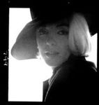 1962_07_10_by_bert_stern_dark_costume_with_hat_face_2_07