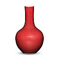 A red-glazed bottle vase, daoguang seal mark and of the period (1821-1850)