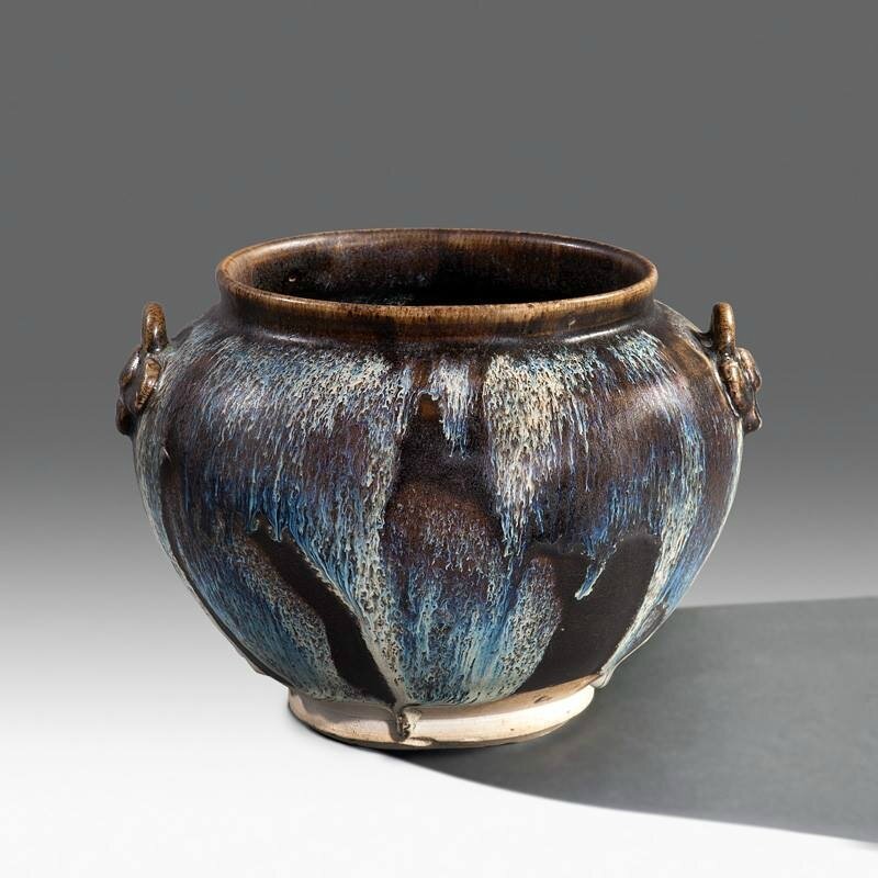 A Lushan phosphatic-splashed handled jar, Tang dynasty (618-906), 8th or 9th century