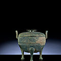 A large archaic bronze ritual food vessel and cover, ding, warring states period, 5th century bc