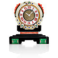 Cartier art deco gold, platinum, black onyx, carved jade and coral, cabochon colored stone, diamond and enamel desk clock, franc