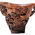 An extraordinary finely carved rhinoceros horn libation cup, 17th-18th century