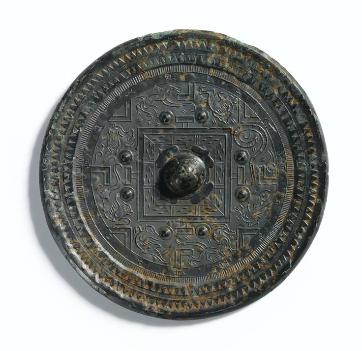 A bronze 'TLV' mirror, Han Dynasty