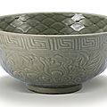 A large carved ‘longquan’ celadon bowl, ming dynasty, 15th century