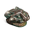 A silver-inlaid bronze 'tiger head' ornament, eastern zhou dynasty, warring states period (475-221 bc)