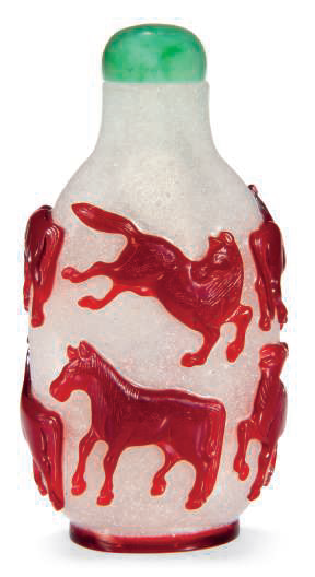 A red glass overlay 'Eight horses of Muwang' snuff bottle, Qing dynasty (1644-1911)