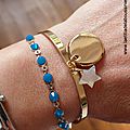Demi jonc Love my children (médaille en plaqué or et étoile en nacre) et bracelet Kibrille bleu lagon portés - 69 € et 25 €
