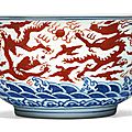 A rare and large iron-red and blue ‘dragon’ bowl, jiajing mark and period (1522-1566)