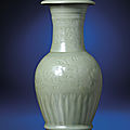 A fine carved Longquan celadon baluster vase, Yuan dynasty (1279-1368) 