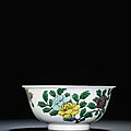 A fine famille verte 'dragon' incised bowl, Kangxi six-character mark within a double circle and of the period (1662-1722)